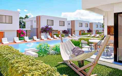 An apartment on the ground floor and a penthouse in a gated complex with a swimming pool in a picturesque place Yeni - Erenkoy