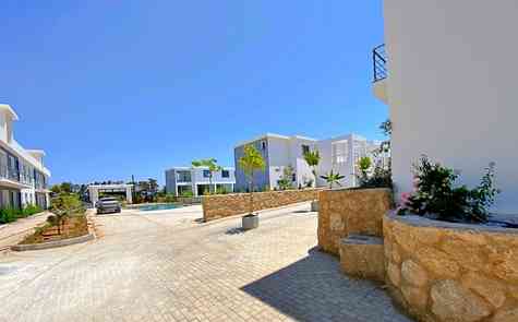 Finished apartments in a complex on the sea, 2 + 1 with a garden and penthouses