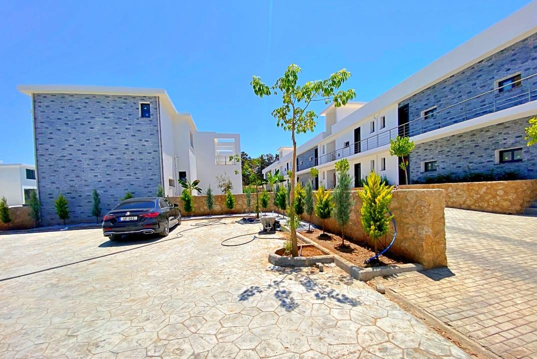 Finished apartments in a complex on the sea, 2 + 1 with a garden and penthouses