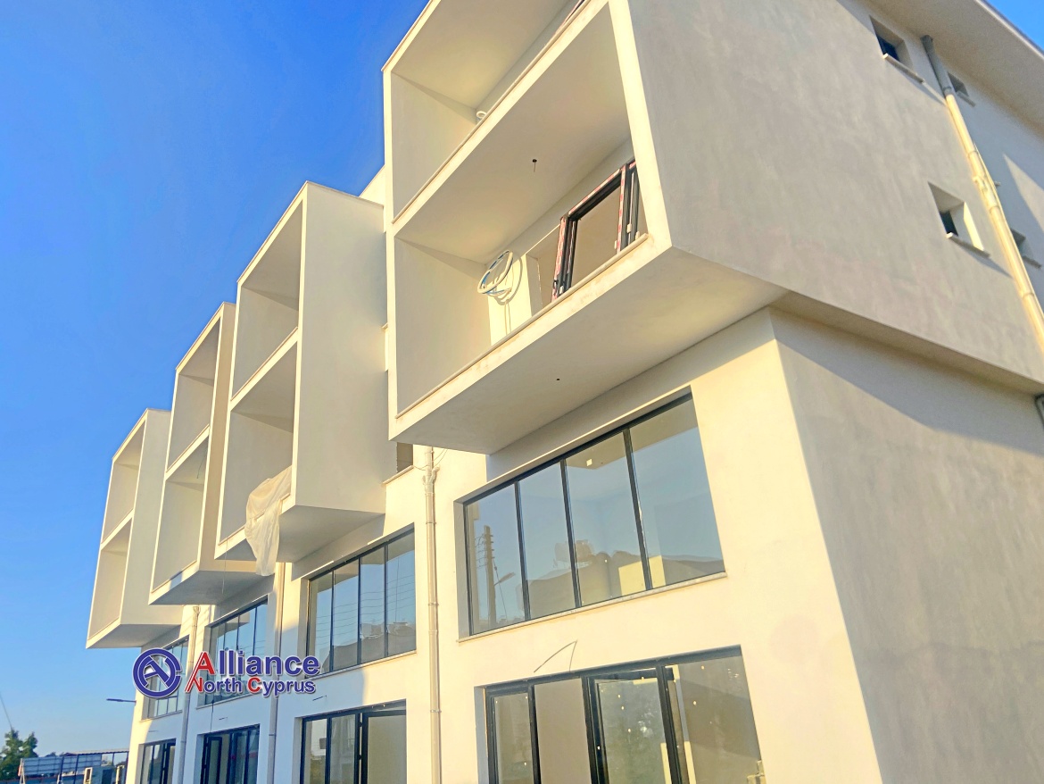 One bedroom apartments in a new guarded complex with a swimming pool in Alsancak