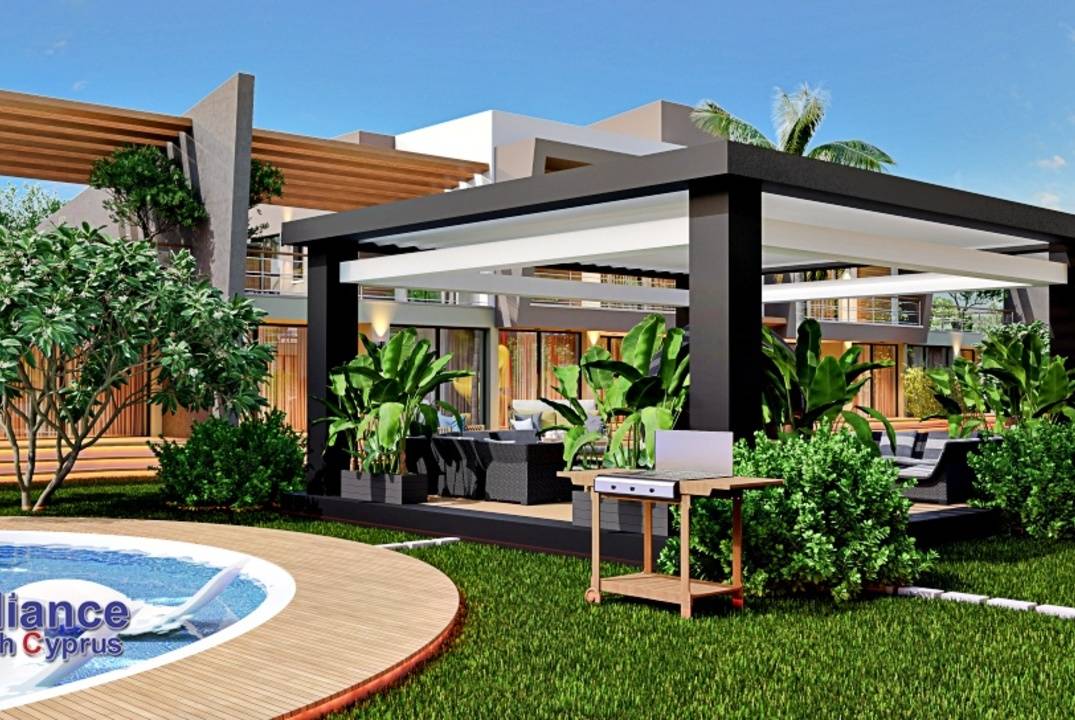 Apartments 2+1 with a private garden and a terrace in a residential complex in Otyuken, in Iskele