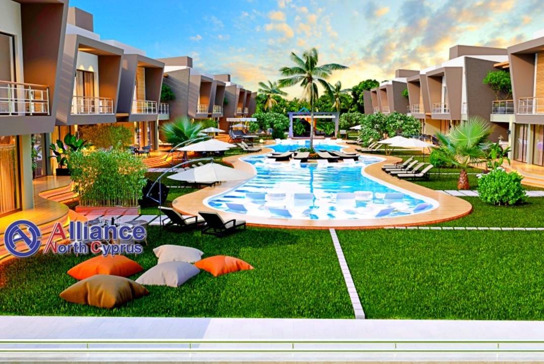 Apartments 2+1 with a private garden and a terrace in a residential complex in Otyuken, in Iskele