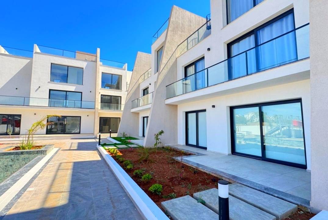 Corner 2+1 Loft Apartment with Private Roof Terrace at Garden Park, Iskele