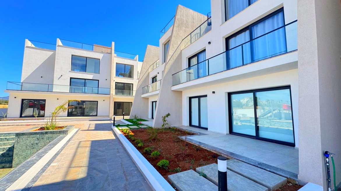 Corner 2+1 Loft Apartment with Private Roof Terrace at Garden Park, Iskele