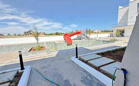 Corner 2+1 Loft Apartment with Private Roof Terrace at Garden Park, Iskele