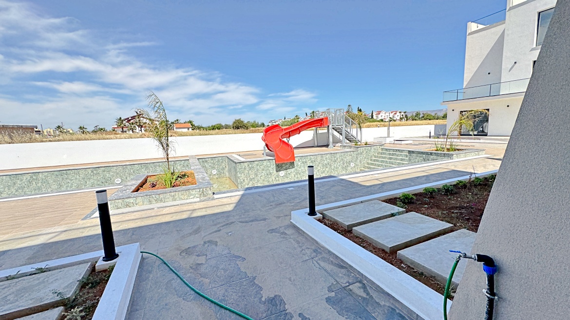 Corner 2+1 Loft Apartment with Private Roof Terrace at Garden Park, Iskele