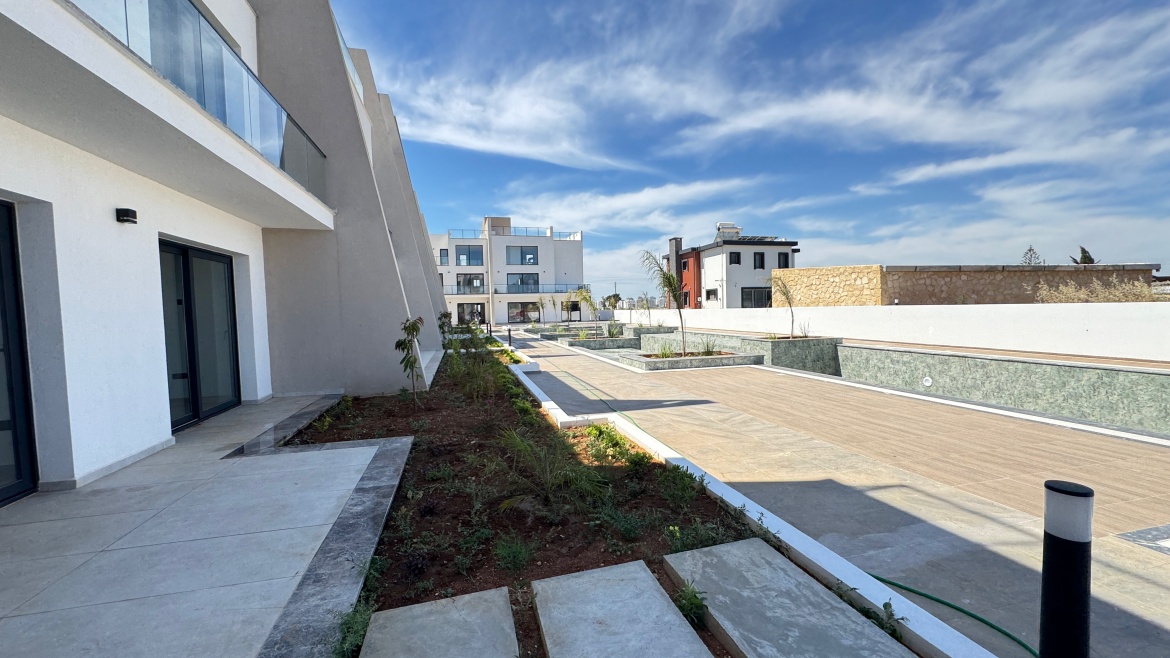 Corner 2+1 Loft Apartment with Private Roof Terrace at Garden Park, Iskele