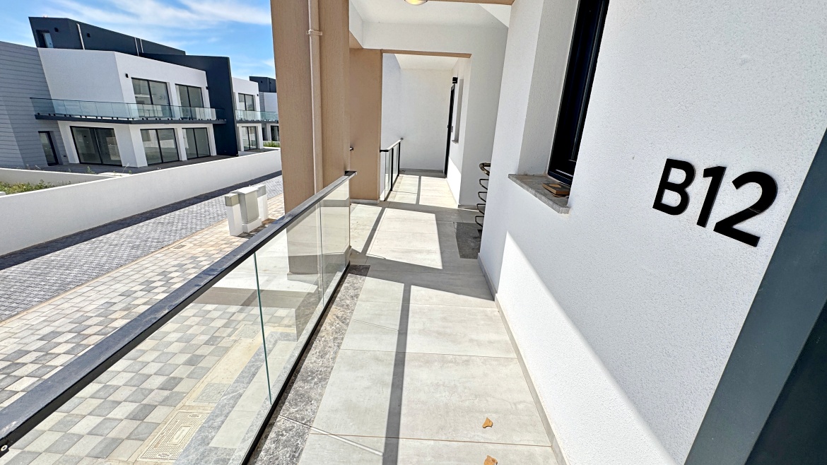 Corner 2+1 Loft Apartment with Private Roof Terrace at Garden Park, Iskele